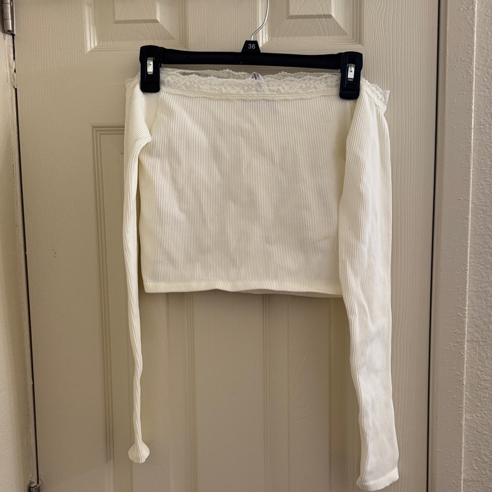 Ribbed out from under white off the shoulder top